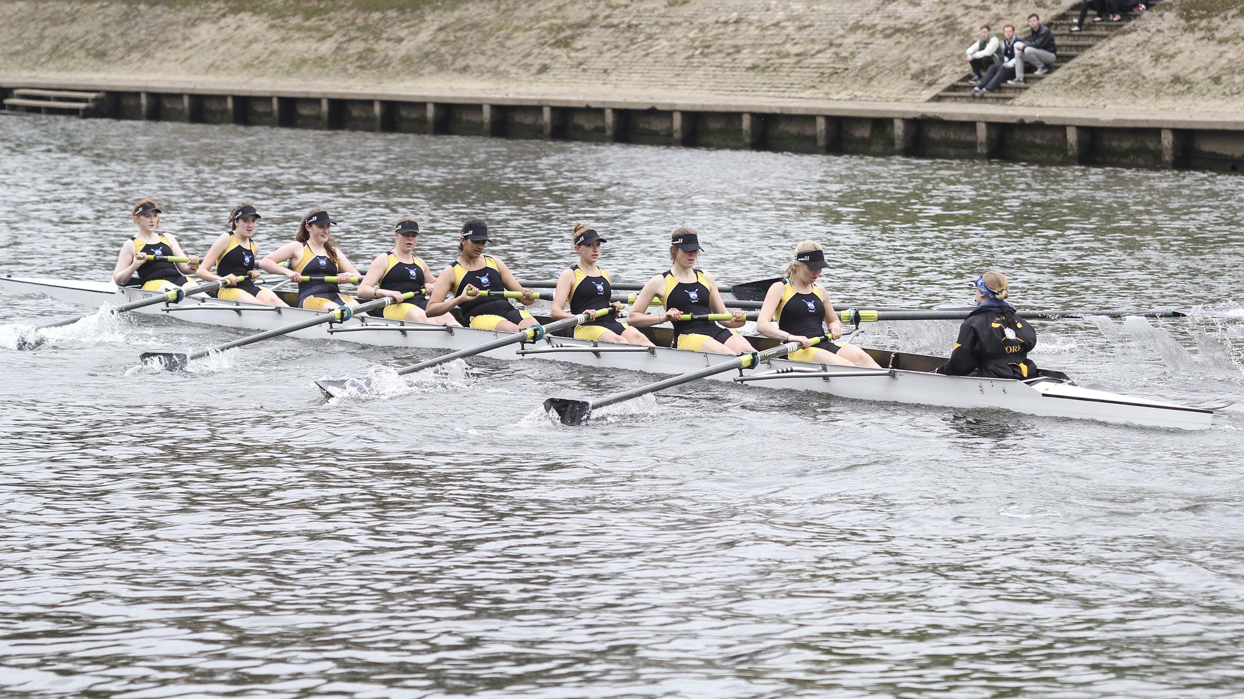 Members of the Women's Eights team, part of the University Boat Club, row on the River Ouse as part of the annual Roses competition.