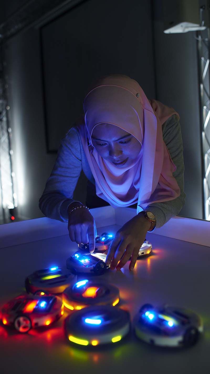Student carrying out research in robotics in the Department of Computer Science.